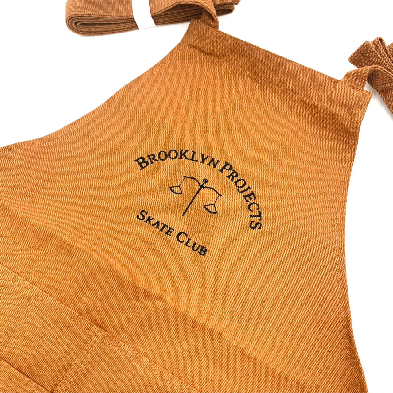 BP SKATE CLUB APRON CAMEL